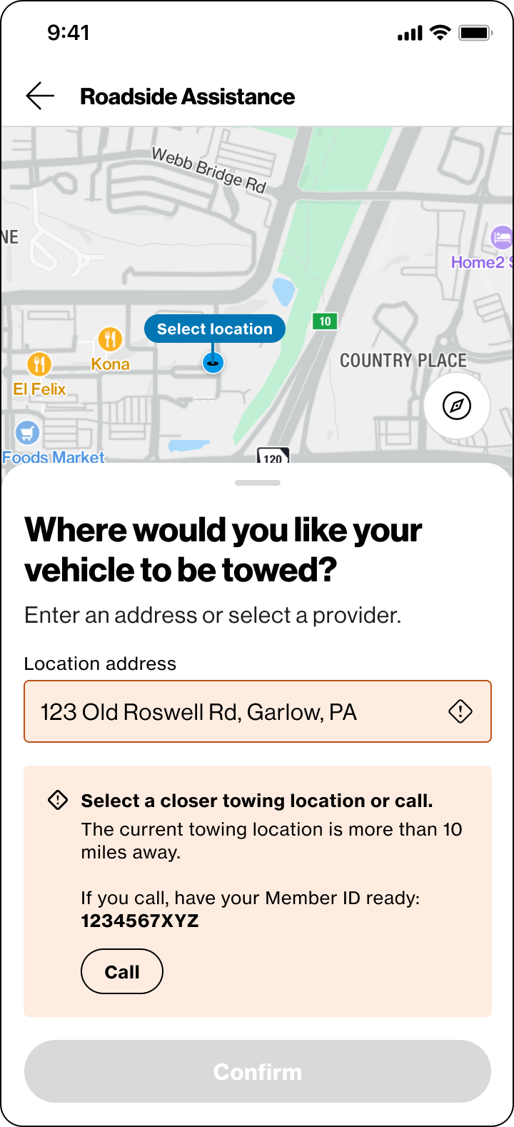 A Roadside Assistance screen. A map with a “Select location” pin sits above a drawer headed “Where would you like your vehicle to be towed?”. The location address field, reading 123 Old Roswell Rd, Garlow, PA, is outlined in amber with a warning icon. Beneath it an amber panel headed “Select a closer towing location or call.” explains that the current towing location is more than 10 miles away, gives a member ID of 1234567XYZ to have ready, and offers a Call button. The Confirm button below is greyed out.